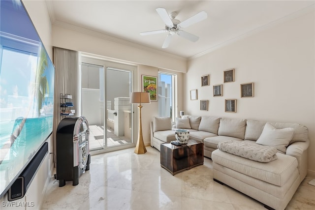 living room featuring ceiling fan and ornamental molding