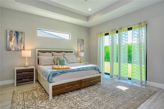 bedroom with wood-type flooring