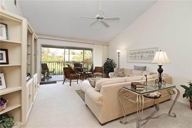 living room featuring ceiling fan, high vaulted ceiling, and light carpet