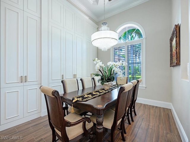 dining room with ornamental molding and dark hardwood / wood-style floors