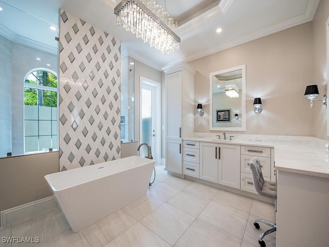 bathroom featuring vanity, tile patterned floors, ornamental molding, and a washtub