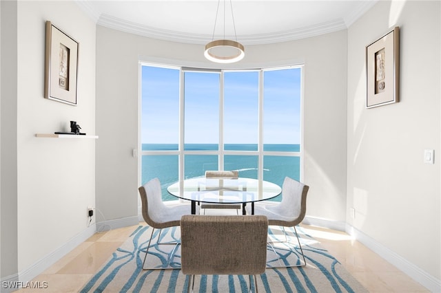 dining area featuring a water view, light tile patterned flooring, and crown molding