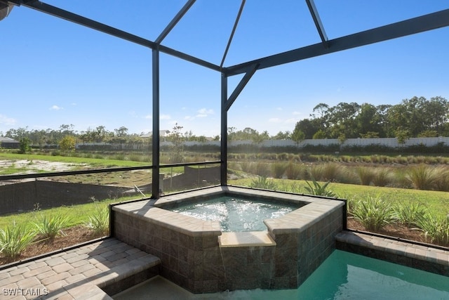 sunroom featuring a hot tub