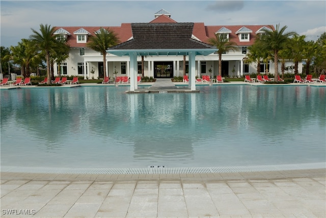 view of swimming pool featuring a patio