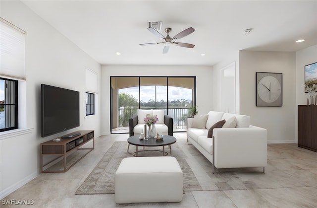 living room featuring ceiling fan