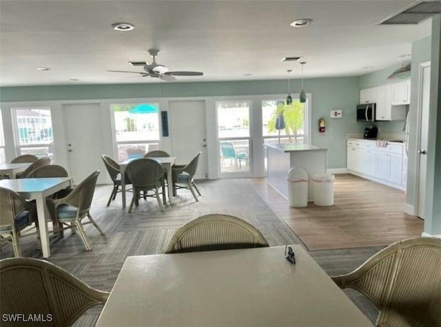 4301 Island Cir Unit 2, Fort Myers, FL 33919 - dining space with healthy amount of natural light, ceiling fan, and recessed lighting