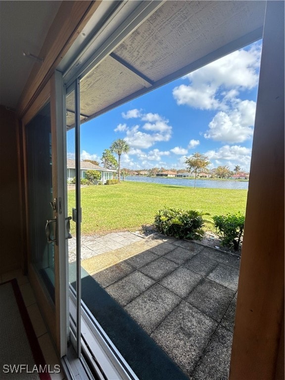 entryway with a water view