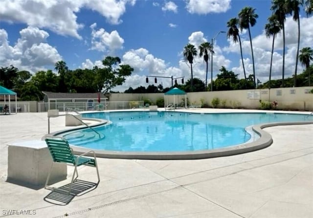 4301 Island Cir Unit 2, Fort Myers, FL 33919 - community pool with a patio area