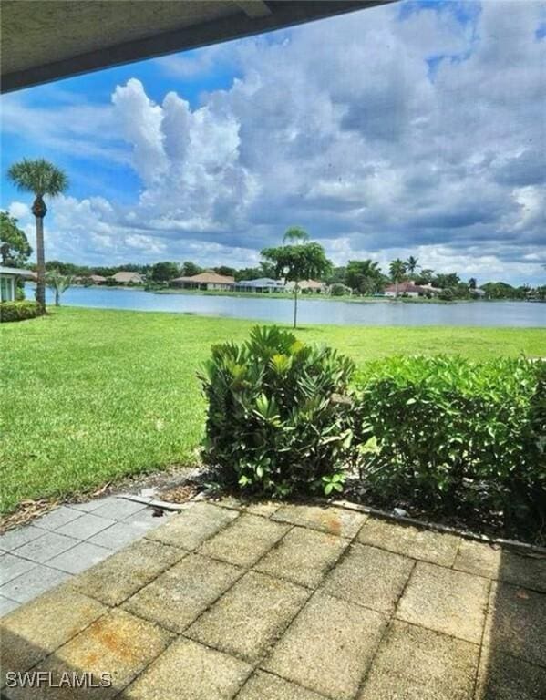 4301 Island Cir Unit 2, Fort Myers, FL 33919 - view of patio with a water view