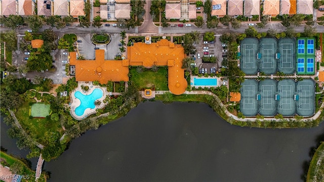 bird's eye view with a water view