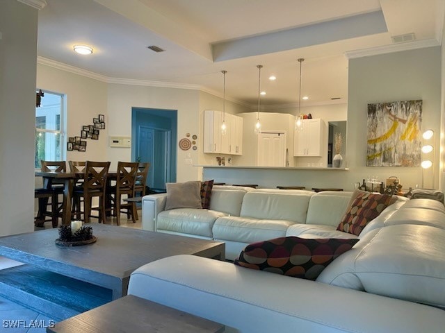 living room featuring ornamental molding