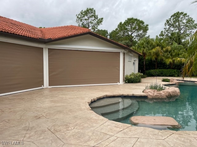 view of pool with a patio area