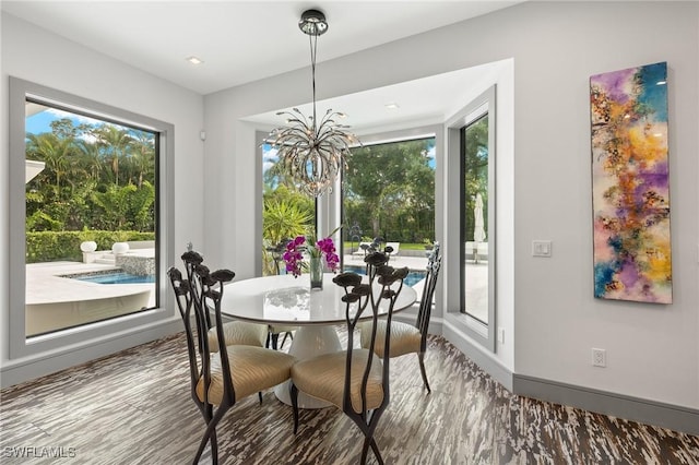 dining area with a notable chandelier