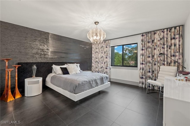 bedroom with an inviting chandelier