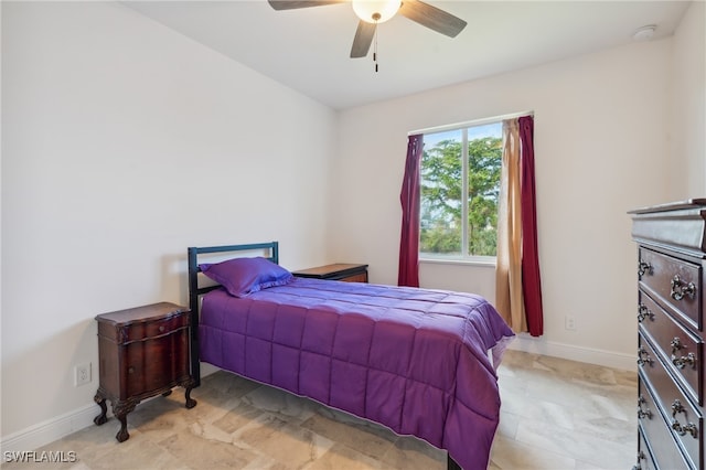 bedroom featuring ceiling fan