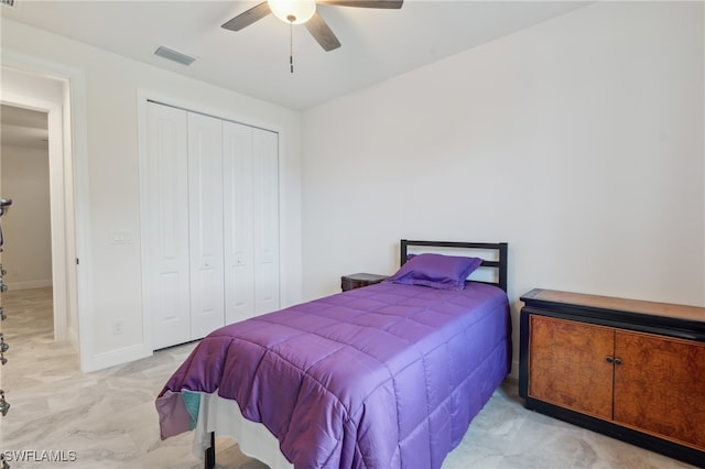 bedroom with a closet and ceiling fan