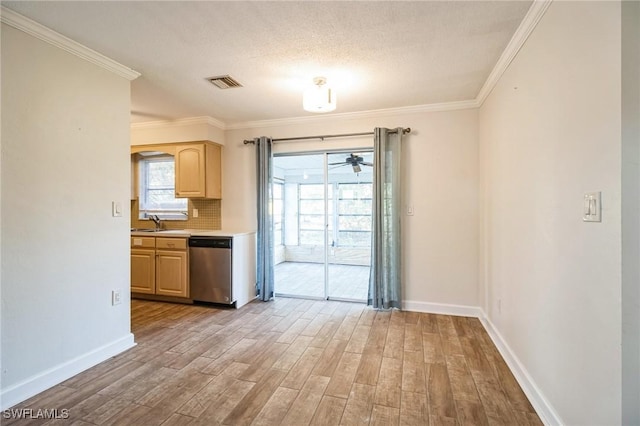 kitchen with dishwasher, crown molding, light wood-type flooring, light brown cabinetry, and tasteful backsplash