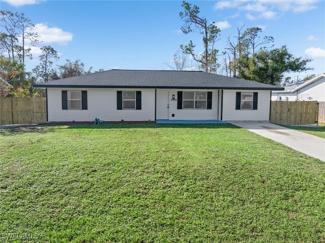 single story home with a front yard