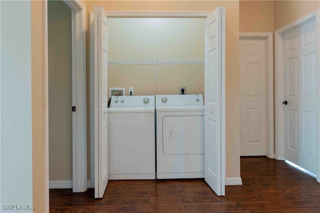 laundry area featuring independent washer and dryer and dark hardwood / wood-style floors