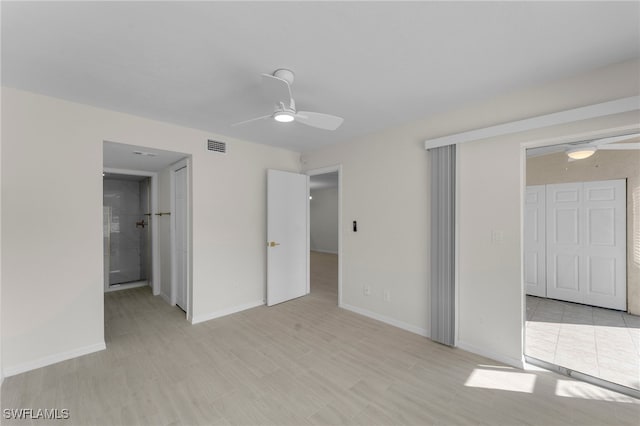 unfurnished bedroom featuring a closet and ceiling fan