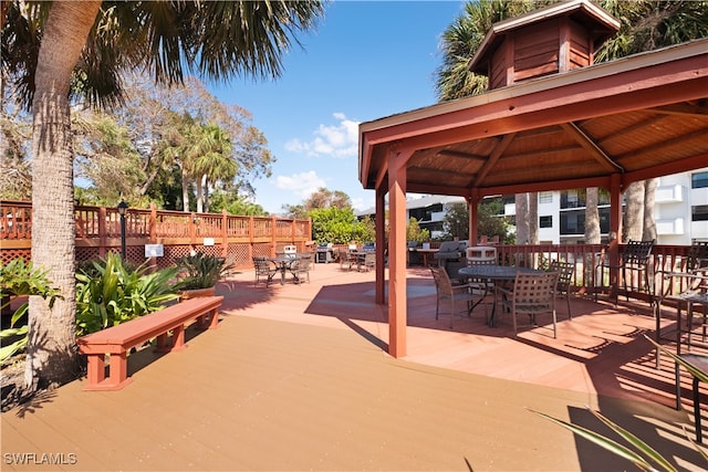 view of patio with a deck and a gazebo