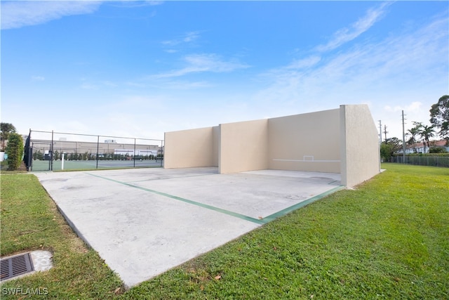 exterior space featuring tennis court