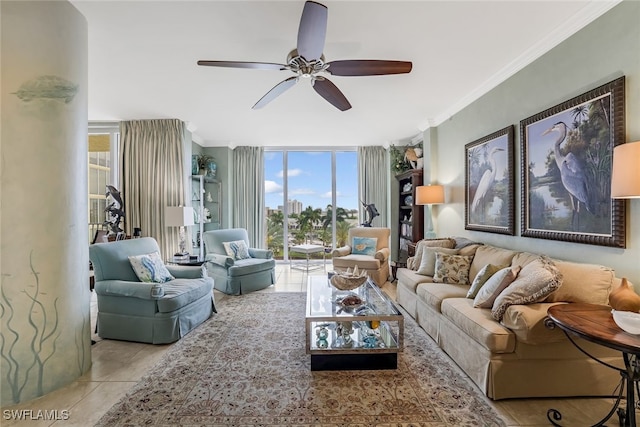 living room featuring ceiling fan, plenty of natural light, expansive windows, and light tile patterned floors