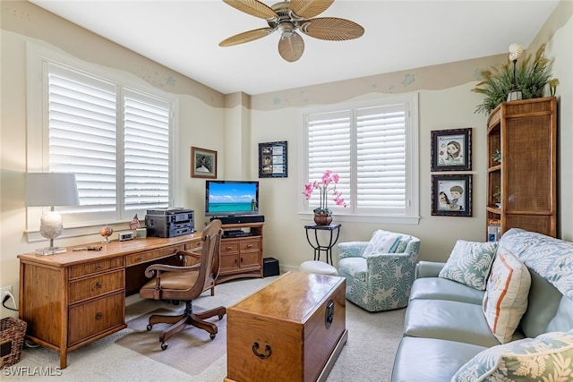 office with ceiling fan and light carpet