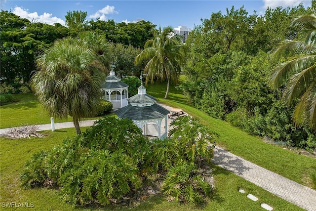 view of community featuring a gazebo and a yard