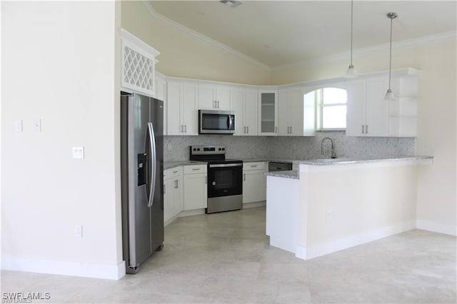 kitchen featuring lofted ceiling, kitchen peninsula, stainless steel appliances, decorative light fixtures, and white cabinets