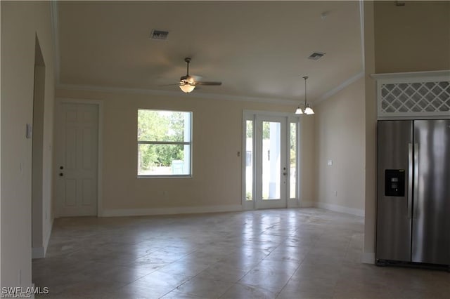 empty room with ornamental molding and ceiling fan with notable chandelier