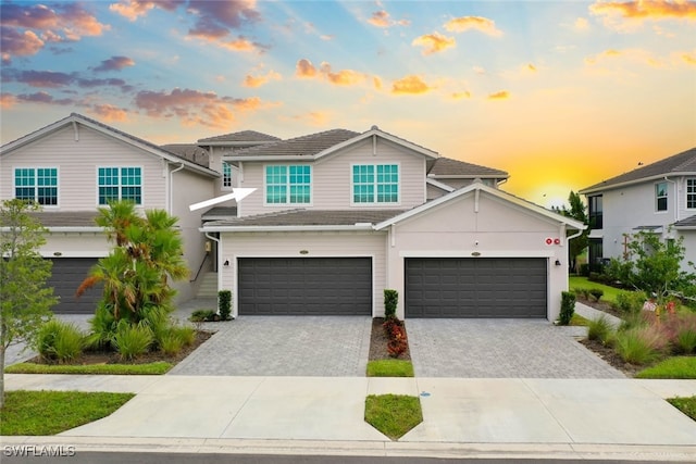 view of front of property with a garage