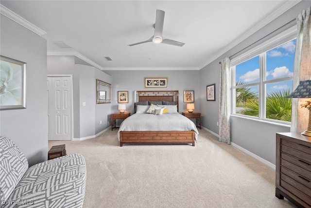 bedroom with light carpet, crown molding, and ceiling fan