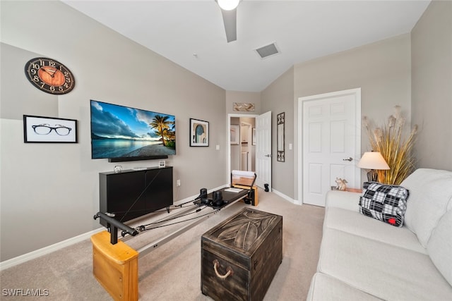 carpeted living room featuring ceiling fan