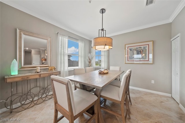 tiled dining space with ornamental molding