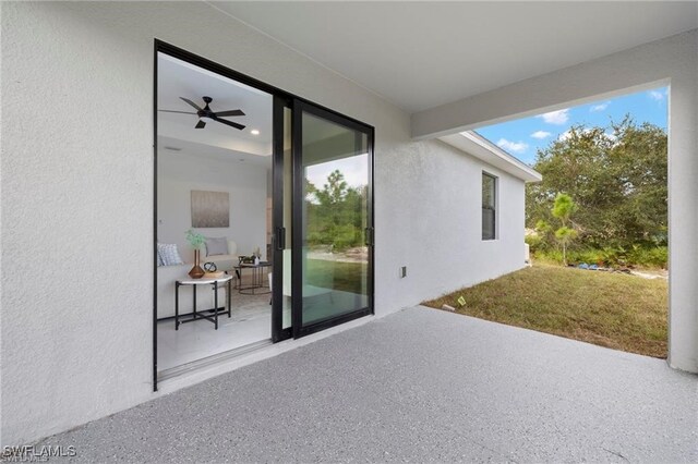 view of patio with ceiling fan