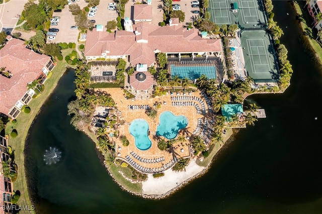 birds eye view of property featuring a water view