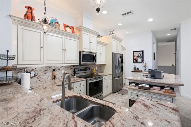 kitchen featuring crown molding, pendant lighting, decorative backsplash, and stainless steel appliances