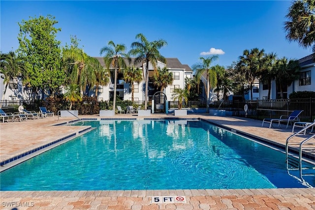 view of pool featuring a patio