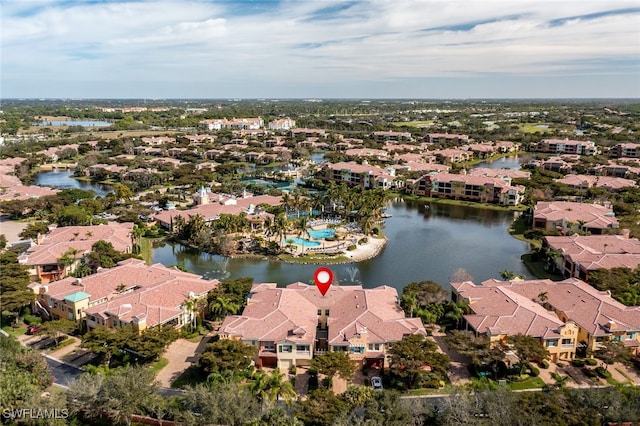 birds eye view of property featuring a water view