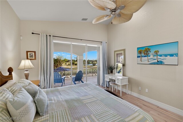 bedroom with access to outside, vaulted ceiling, ceiling fan, and light hardwood / wood-style floors