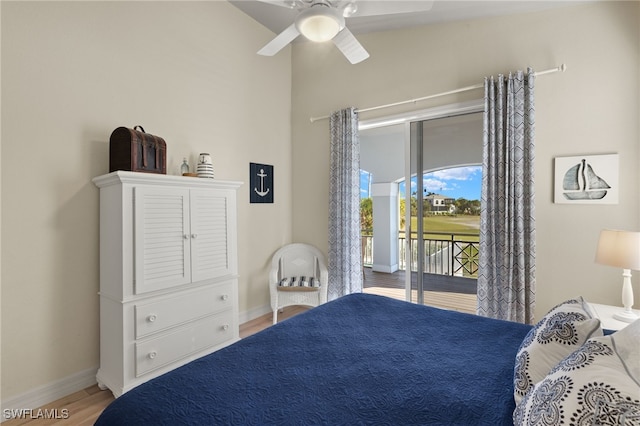 bedroom with access to exterior, ceiling fan, and hardwood / wood-style flooring