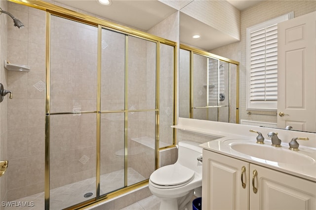 bathroom with walk in shower, tile patterned flooring, vanity, and toilet