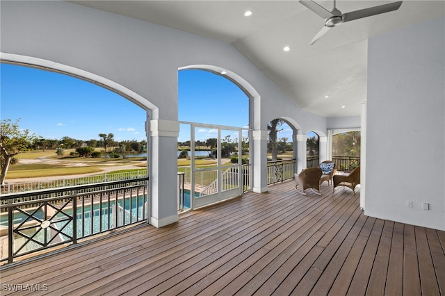 wooden deck with ceiling fan