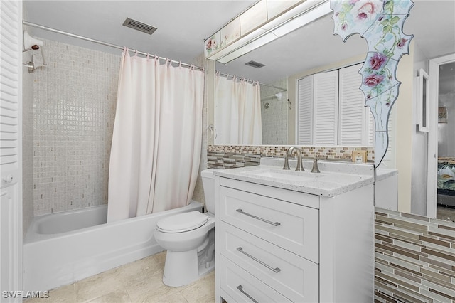 full bathroom featuring tasteful backsplash, toilet, vanity, shower / tub combo with curtain, and tile patterned floors