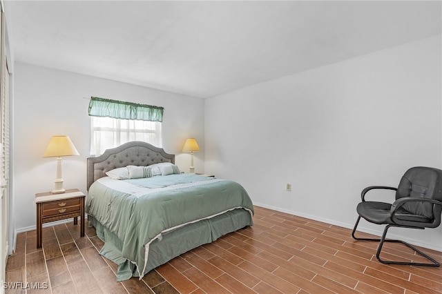 bedroom featuring wood-type flooring