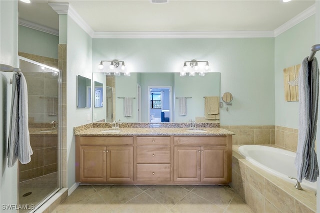 bathroom featuring vanity, crown molding, separate shower and tub, and tile patterned flooring