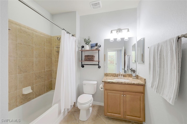 full bathroom with vanity, shower / bath combo, toilet, and tile patterned floors