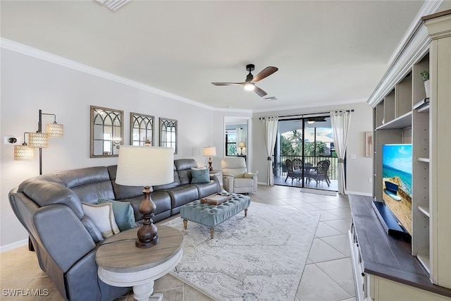 living room with ceiling fan, ornamental molding, and light tile patterned flooring