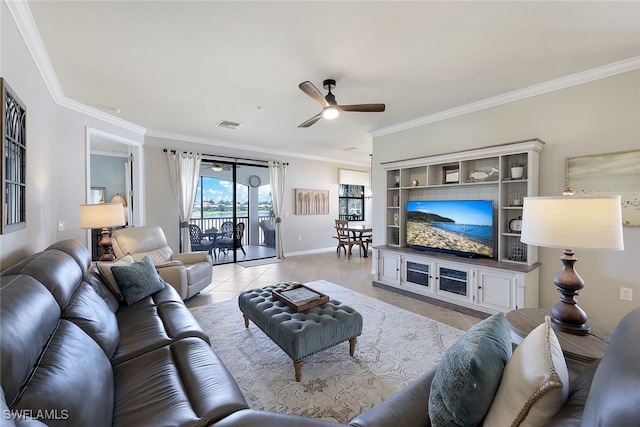 tiled living room featuring ceiling fan, crown molding, and built in features